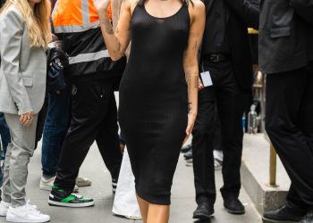 Miley Cyrus Wore a Sexy Black Dress With $950 Flip Flops