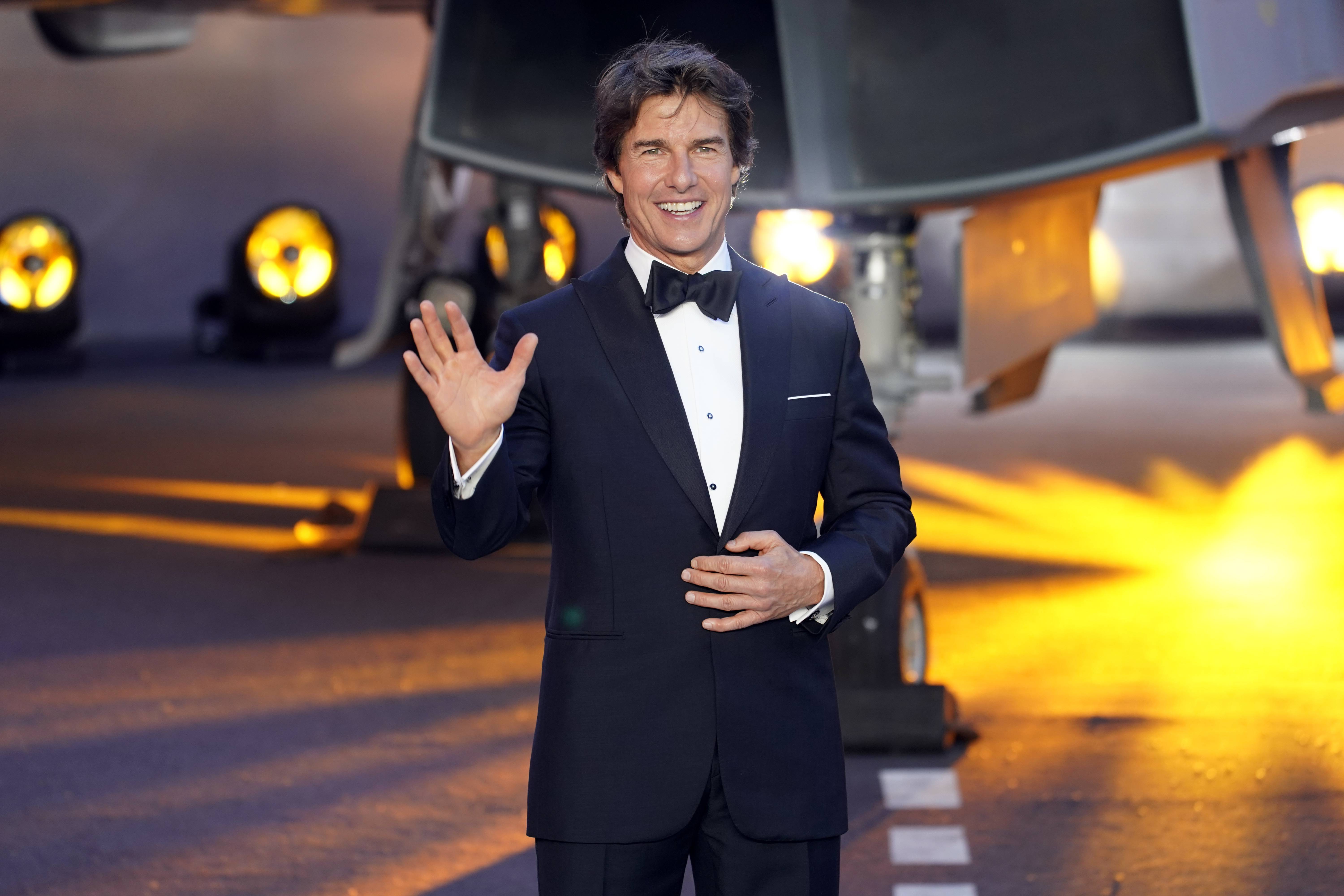 Tom Cruise poses for the media during the 'Top Gun Maverick' UK premiere at a central London cinema, on Thursday, May 19, 2022.