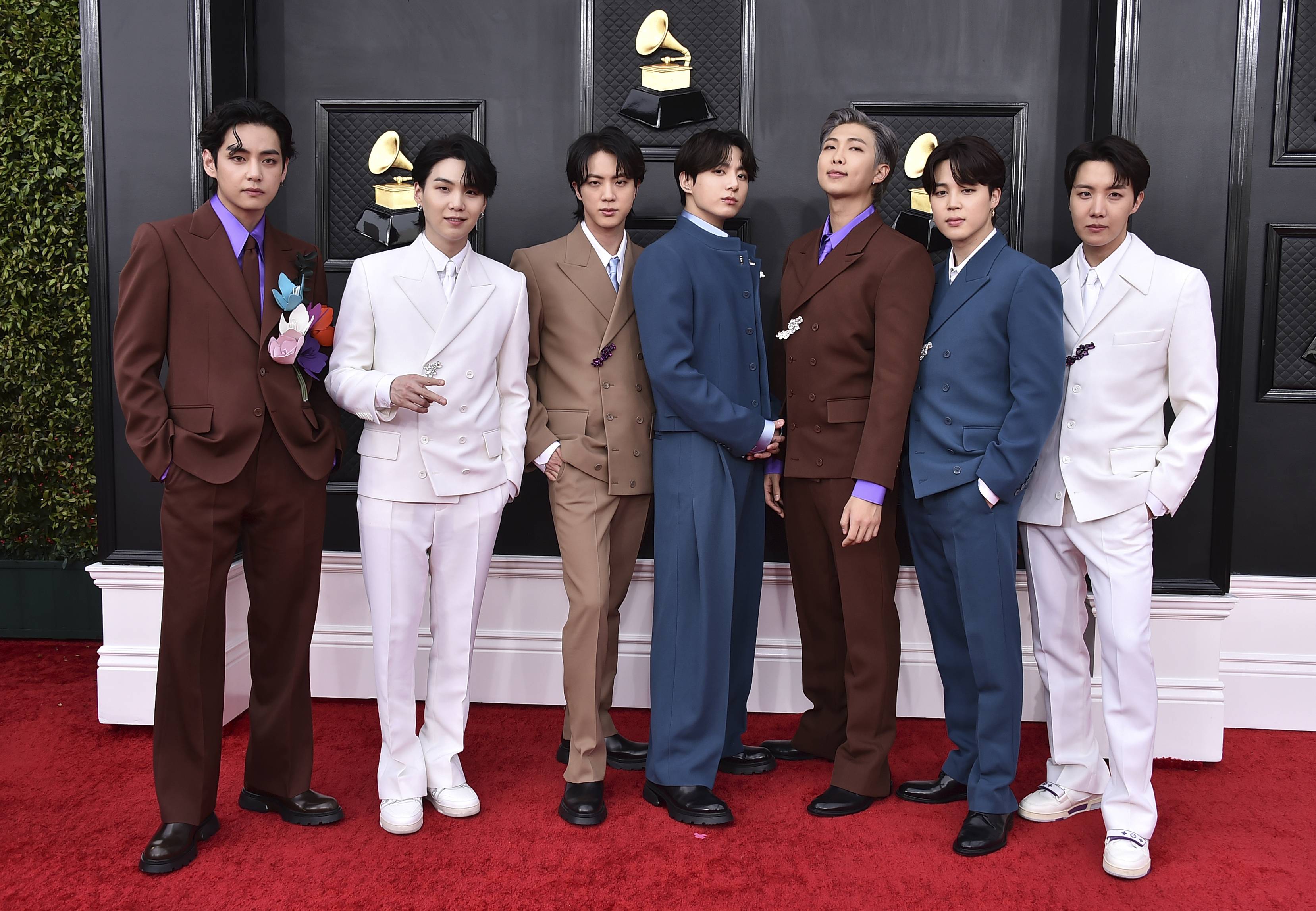 BTS arrives at the 64th annual Grammy Awards on April 3 in Las Vegas. The group members say they are taking time to focus on solo projects.