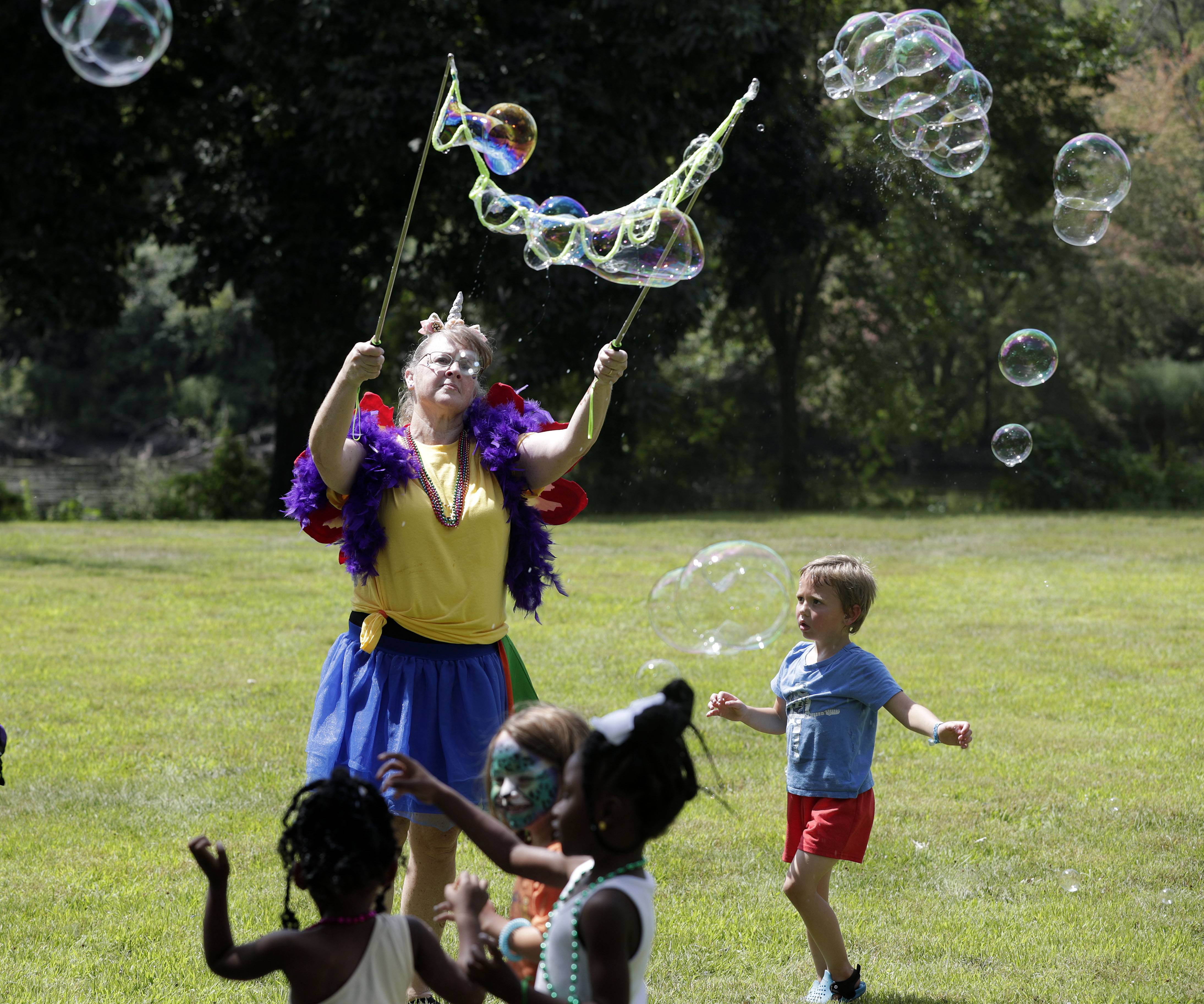 Bubbles kept the kids entertained at the World of Faeries Festival Saturday at Vasa Park in South Elgin.