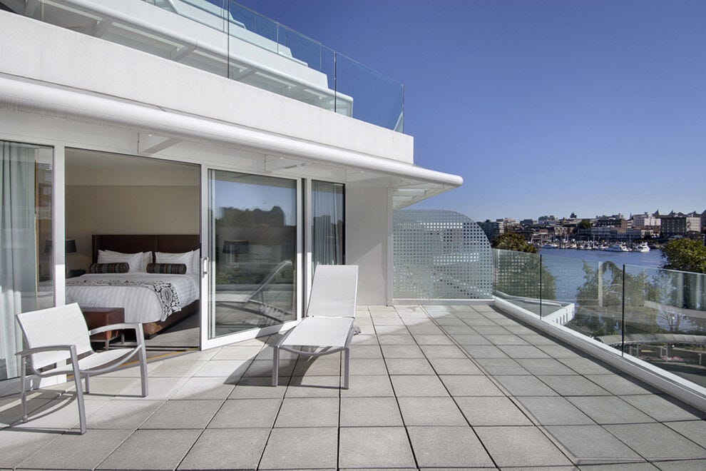The Inn at Laurel Point offers prime balconies from which to watch the city bustle to life