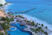  At the point of "the 7," Mexico's Grand Fiesta Americana Coral Beach Cancun enjoys a prime location known for its fine white sand and gentle waves. Photo courtesy of Athena Lucero. 